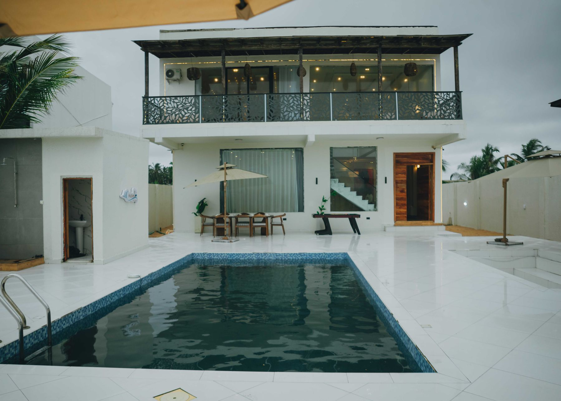 The pool and terrace with the villa behind